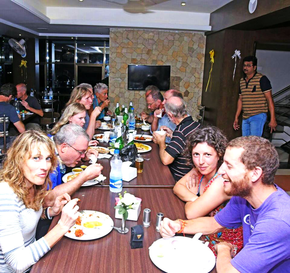 Foreign travellers enjoying meal at Hotel Alankar Devgad