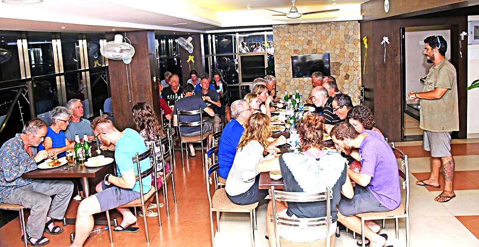 Foreign travellers enjoying meal at Hotel Alankar Devgad